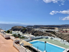 HomeForGuest Amplio apartamento con piscina y terraza en Mogan